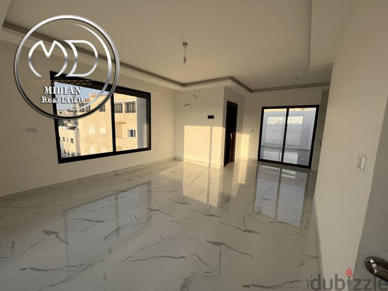 شقة دوبلكس جديدة للبيع ضاحية الامير راشد طابق اخير مع روف مساحة 250م 12
