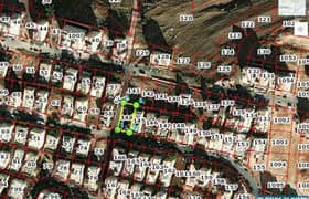 قطعة ارض للبيع في جبل الزهور على شارعين مساحتها 500م