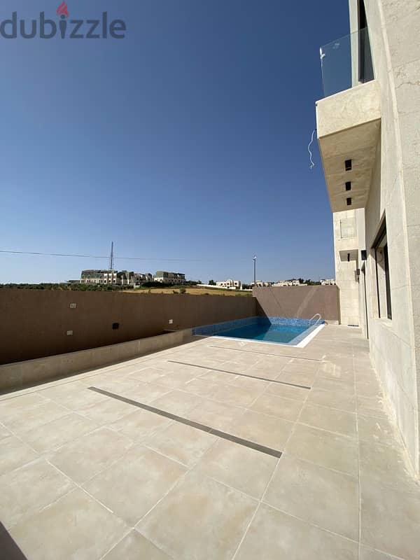 luxury villas for sale in Dabouq 10