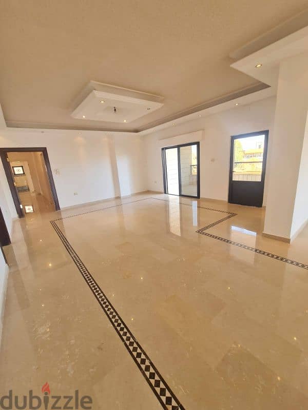 شقة طابقية ٣٥٠م للبيع في أجمل مواقع ضاحية الرشيد علي شارعين مطلة 1