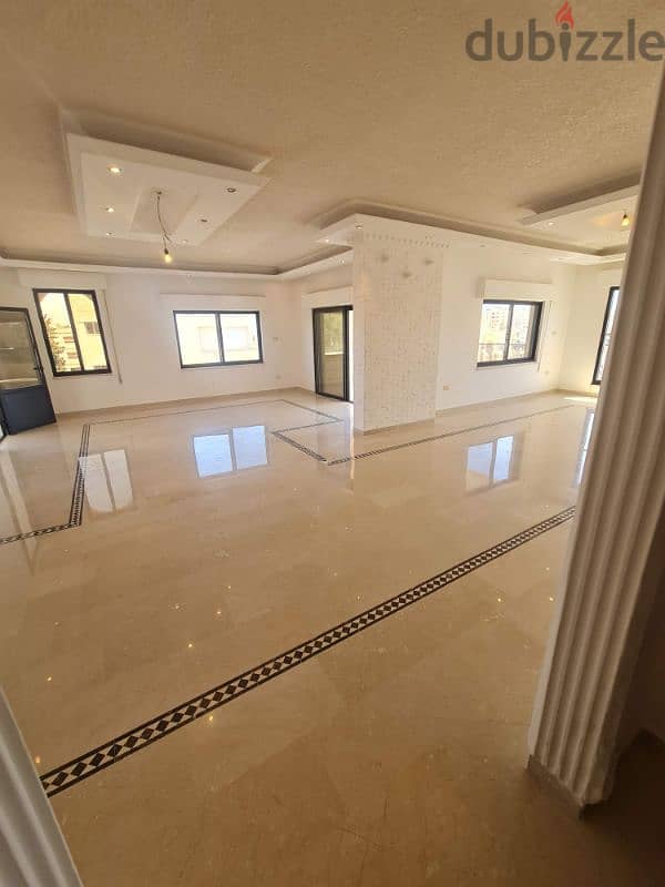 شقة طابقية ٣٥٠م للبيع في أجمل مواقع ضاحية الرشيد علي شارعين مطلة 8