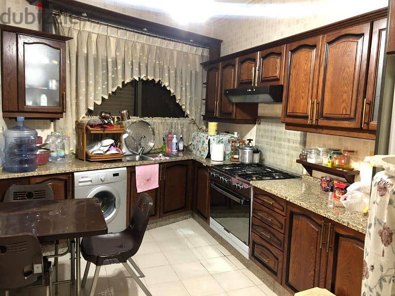 المدينه الرياضيه شقه ارضيه للبيع مساحه 213م مع تراسات 250م مكرمد 7