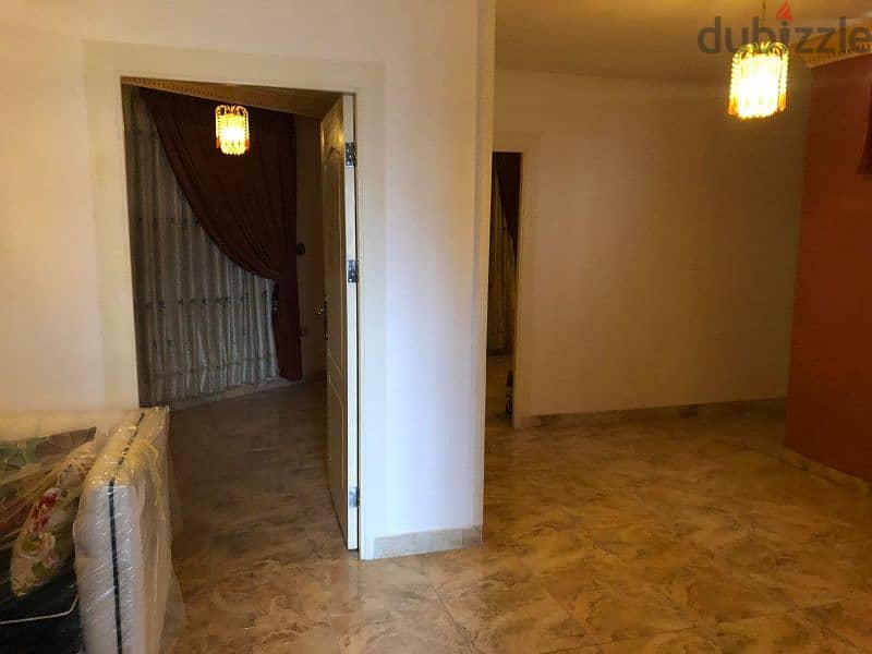 المدينه الرياضيه شقه ارضيه للبيع مساحه 213م مع تراسات 250م مكرمد 11