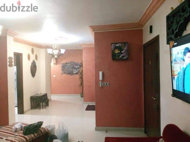 المدينه الرياضيه شقه ارضيه للبيع مساحه 213م مع تراسات 250م مكرمد 18