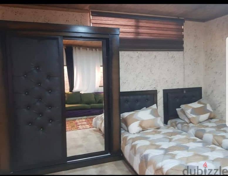 استديو مفروش غرفتين وصالة وحديقة للايجار 4