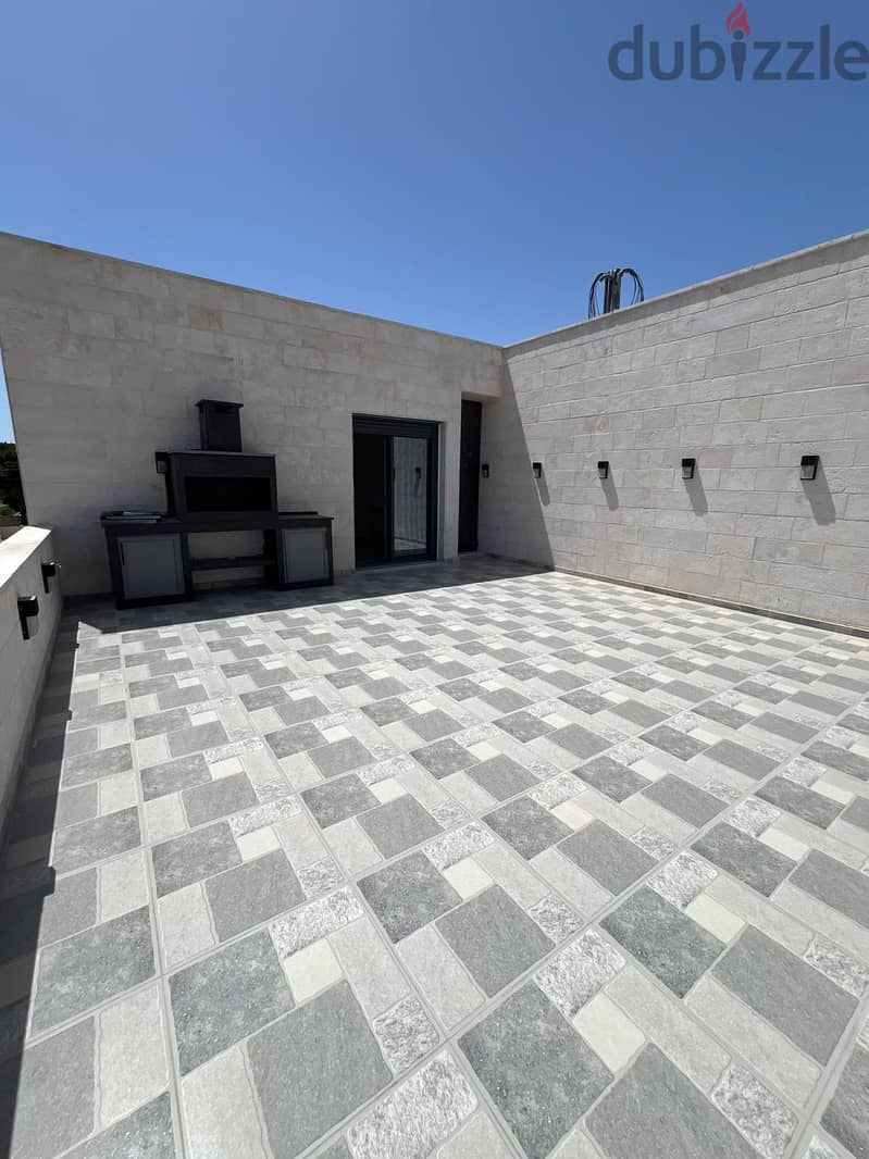 خصم على شقة ثالث مع روف في مرج الحمام اسكان عالية منطقة فلل 1