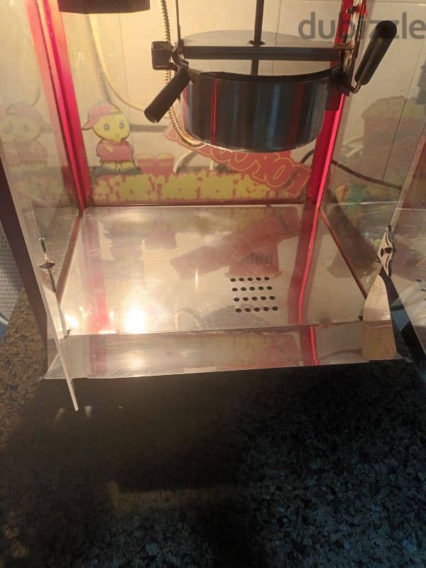 جهاز عمل بوشار A modern, automatic popcorn machine 2