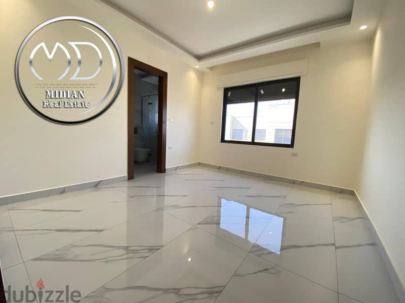شقة دوبلكس جديدة طابق أخير مع روف للبيع ام اذينة مساحة 225م مع تراسات 16