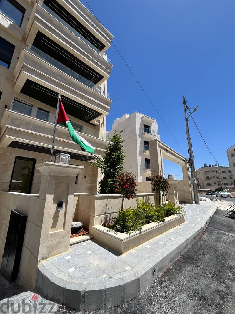 ارضية مع ترس في ضاحية النخيل تشطيب ملوكي فخم 8