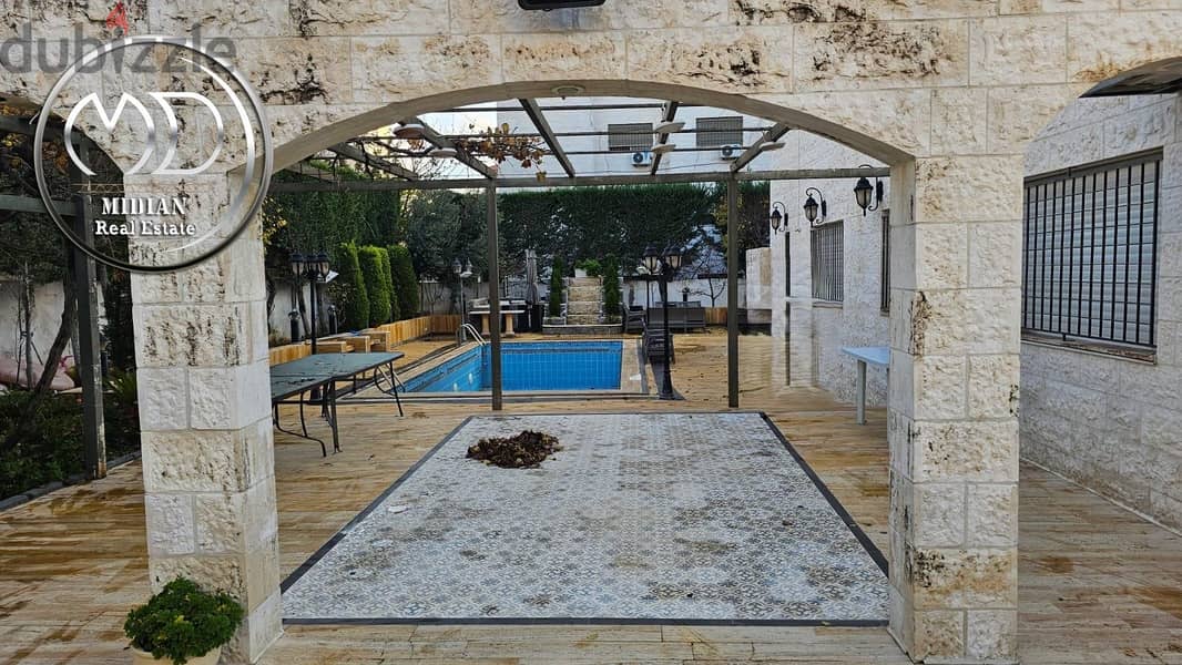 فيلا مستقلة للبيع في أجمل مواقع خلدا مساحة 1100م مع مسبح وتراسات وحدائ 7