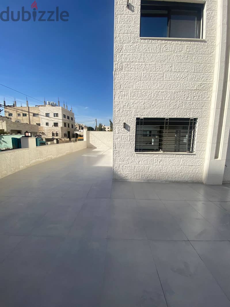 اخر شقة ارضية في ضاحية الامير علي مع ترس و كراج خاص 3