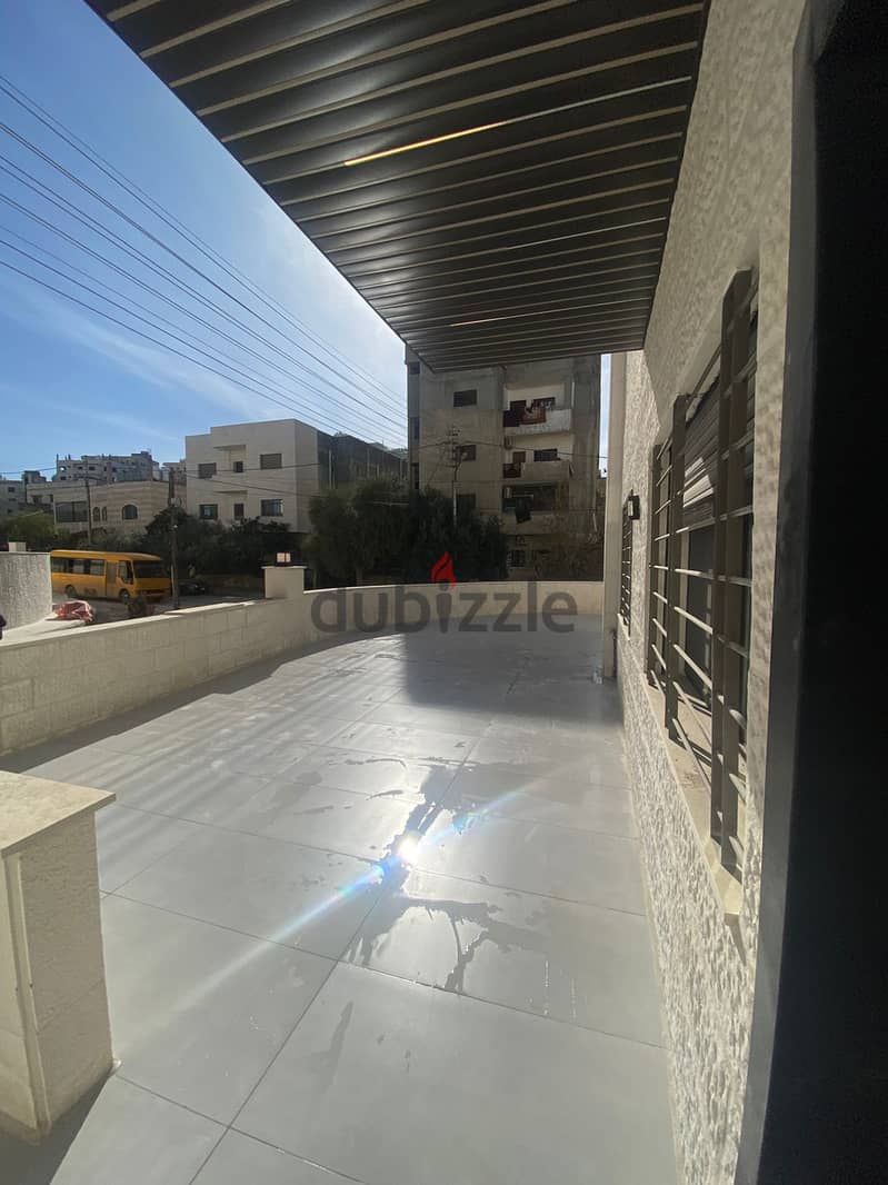 اخر شقة ارضية في ضاحية الامير علي مع ترس و كراج خاص 4