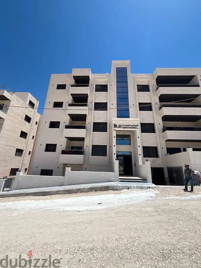 شقة طابق اول بموقع مميز وسعر مناسب في البنيات خلف جامعة البترا