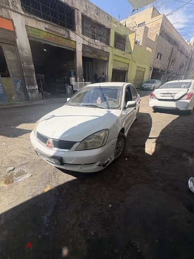 ميتسوبيشي لانسر 2003
