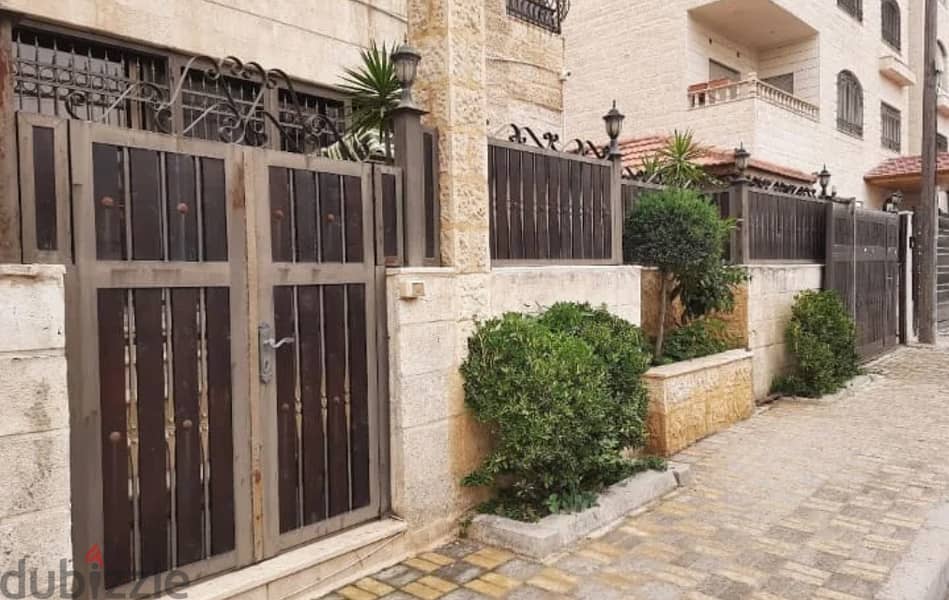 شقة ارضية فاخرة خلدا 174م + 200م حديقة + كراج خاص منطقة فلل 7