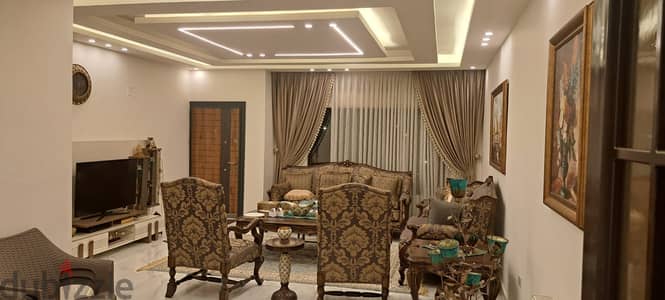 شقة ارضية فاخرة 215م+حديقة 200م وكراج خاص ضاحية الرشيد 4غرف نوم